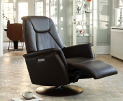 Stressless power recliner with adjustable headrest, available in a variety of top grain leathers.